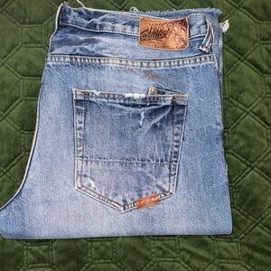 PRPS Faded Blue Jeans with Distressed Details